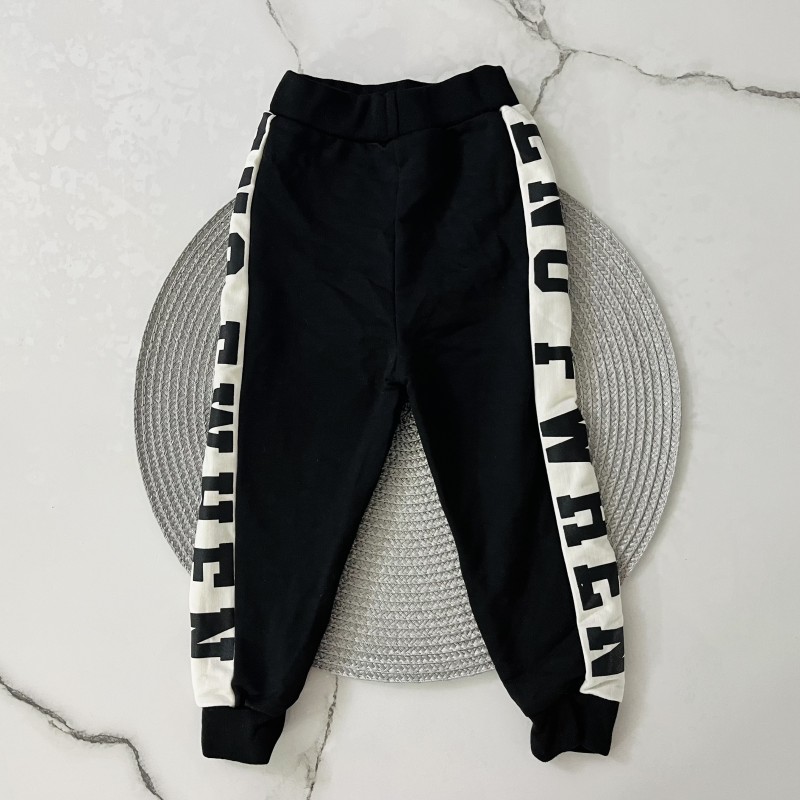 شلوار دورس مشکی بغل نوشته دار kids