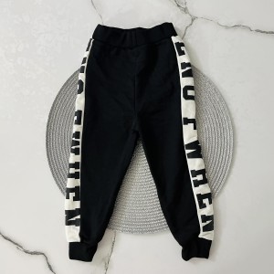 شلوار دورس مشکی بغل نوشته دار kids