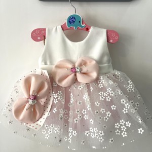 پیراهن عروس و تل صورتی