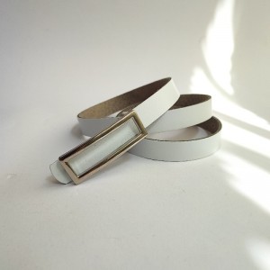 کمربند چرم صنعتی  زنانه با سگک نقره ای مستطیلی.jpg