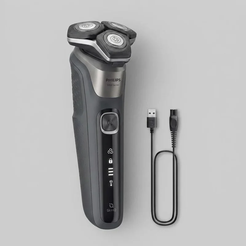 ماشین اصلاح موی صورت فیلیپس مدل SHAVER 5000 Series با تیغه‌های کربن استیل، سنسور هوشمند، سرهای انعطاف‌پذیر 360 درجه، ضد آب، قابلیت اصلاح با شماره صفر، شارژ سریع و منبع انرژی کابل USB