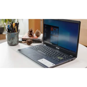 لپ‌تاپ ایسوس مدل Vivobook Go 14 E410KA-CL464 با پردازنده Celeron N4500، رم DDR4 4GB، حافظه eMMC با ظرفیت 64GB، نمایشگر 14 اینچ TN با وضوح HD، دارای نامبرپد دیجیتال