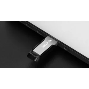 فلش مموری سن دیسک مدل Ultra Flair CZ73 ظرفیت 16 گیگابایت با بدنه فلزی، پورت USB 3.0، سازگار با USB 2.0 و قابلیت رمزگذاری فایل‌ها