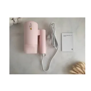 سشوار مسافرتی 1600 وات میجیا مدل H101، موتور AC، وزن 500 گرم، دارای سری متمرکز‌کننده باریک با ویژگی صاف‌کنندگی، حجم‌دهندگی، با قابلیت باد سرد