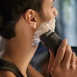 ماشین اصلاح موی صورت فیلیپس مدل X3021 با تیغه استیل ضد زنگ، اصلاح چرخشی و صفر زن، استفاده خشک و مرطوب، شارژ سریع 5 دقیقه‌ای، شارژ کامل 60 دقیقه‌ای برای 40 دقیقه استفاده، ضد آب و قابل شستشو و طراحی ارگونومیک