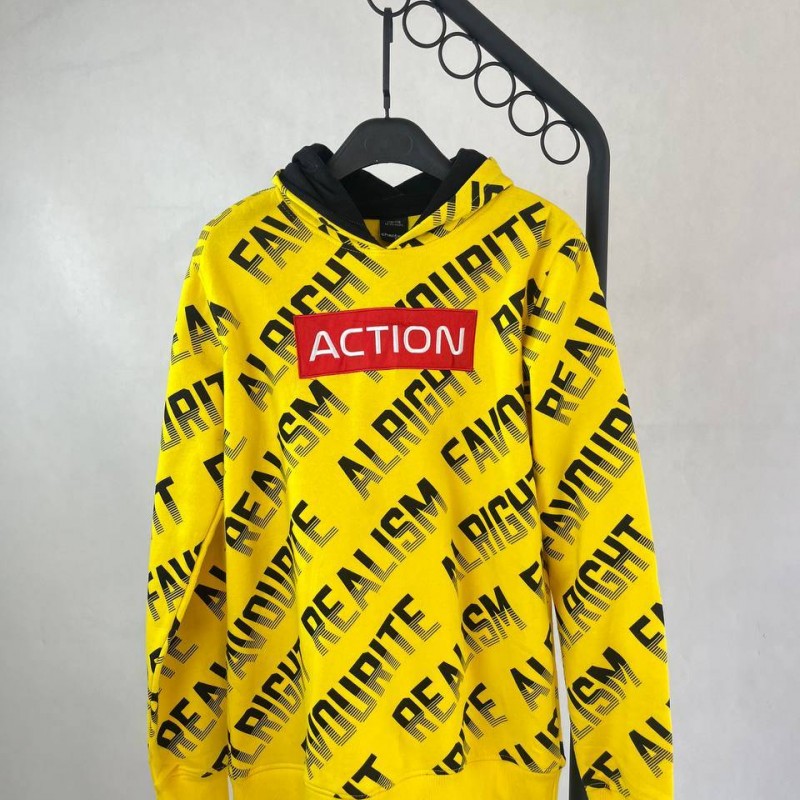 هودی طرح دار مردانه اکشن مدل زرد نئونی
