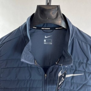 کاپشن زنانه نایکی نیم تنه آبی با طراحی ویژه برای راحتی بیشتر