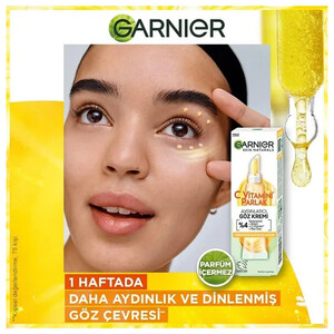 کرم دور چشم ضد تیرگی و روشن‌کننده گارنیه حاوی ویتامین C و نیاسینامید مدل Vitamin C Brightening حجم 15 میل