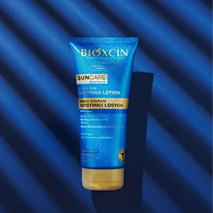 لوسیون تسکین‌دهنده افترسان صورت و بدن بیوکسین مدل SUN CARE SOOTHING حاوی آلوئه‌ورا و روغن سویا حجم ۲۰۰ میل