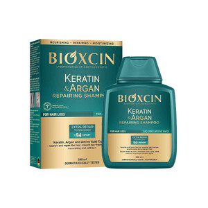 شامپو ترمیم‌کننده و ضد ریزش بیوکسین مدل KERATIN &amp; ARGAN حاوی کراتین و روغن آرگان با خاصیتِ بازسازیِ ۹۴ درصدی حجم ۳۰۰ میل
