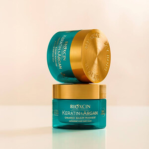 ماسک مویِ بازسازی‌کننده و احیاکننده‌یِ تخصصی بیوکسین مدل KERATIN &amp;amp; ARGAN حاوی کراتین و آرگان با قدرتِ ترمیمِ ۹۴ درصدی حجم ۲۰۰ میل