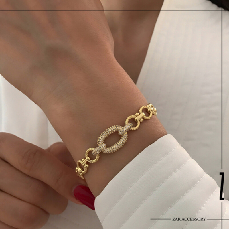 دستبند زنانه زنجیری بیضی نگین‌دار