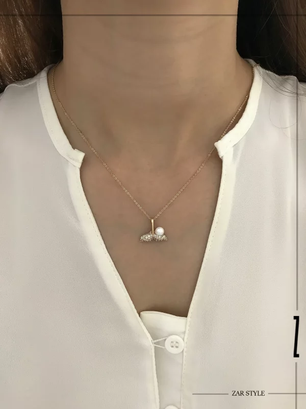 گردنبند دم وال و مروارید