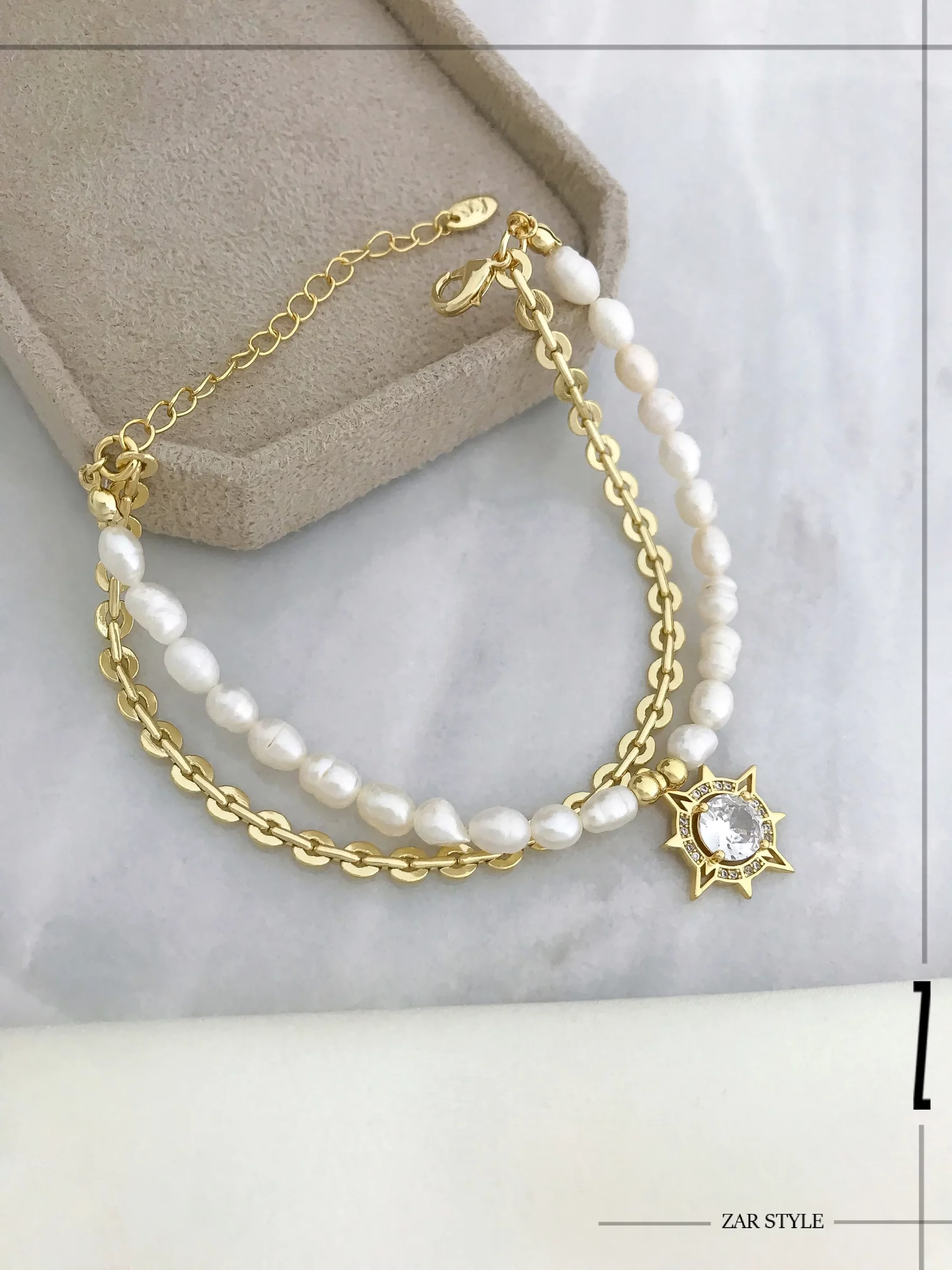 دستبند دولاین مرواریدی آویز خورشید