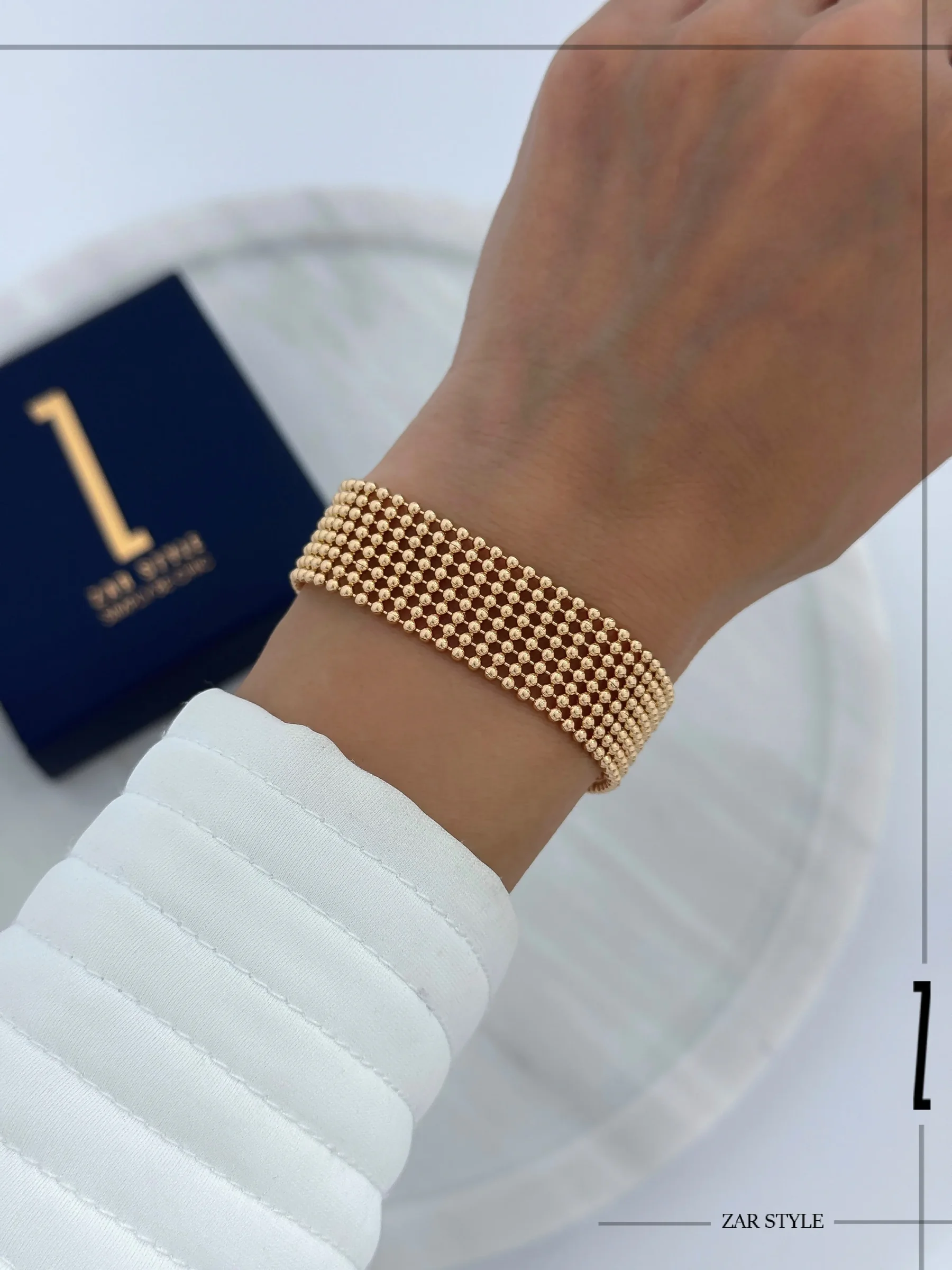 دستبند توری گوی‌دار