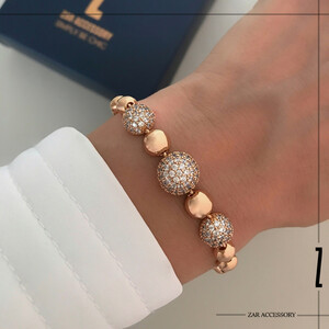 دستبند زنانه گوی آینه‌ای و نگینی