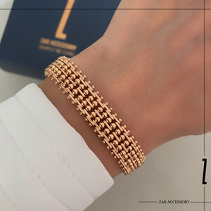 دستبند زنانه گوی حاشیه‌دار