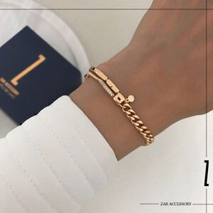 دستبند کارتیه و استخوانی قفل‌دار