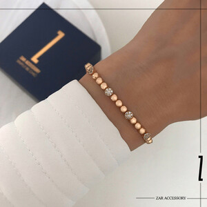 دستبند کارتیه گوی آینه‌ای و نگینی