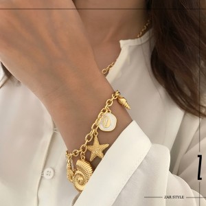 دستبند آویزدار حلزون و ستاره دریایی