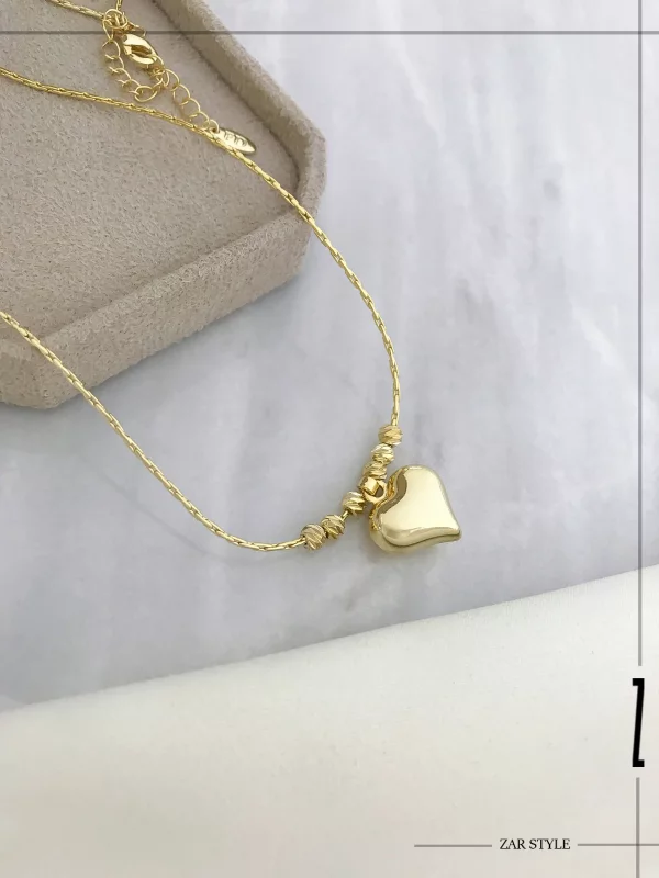 گردنبند گوی تراش و آویز قلب آینه‌ای