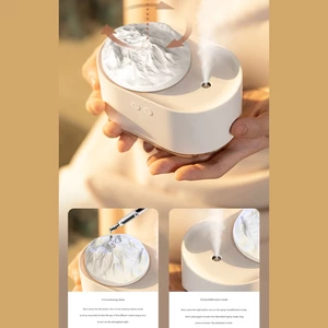 برترین دستگاه رطوبت ساز و آروماتراپی شارژی طرح کوه یخ چرخان