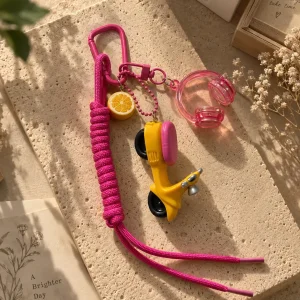 چارم بگ فانتزی موتور و هدفون صورتی