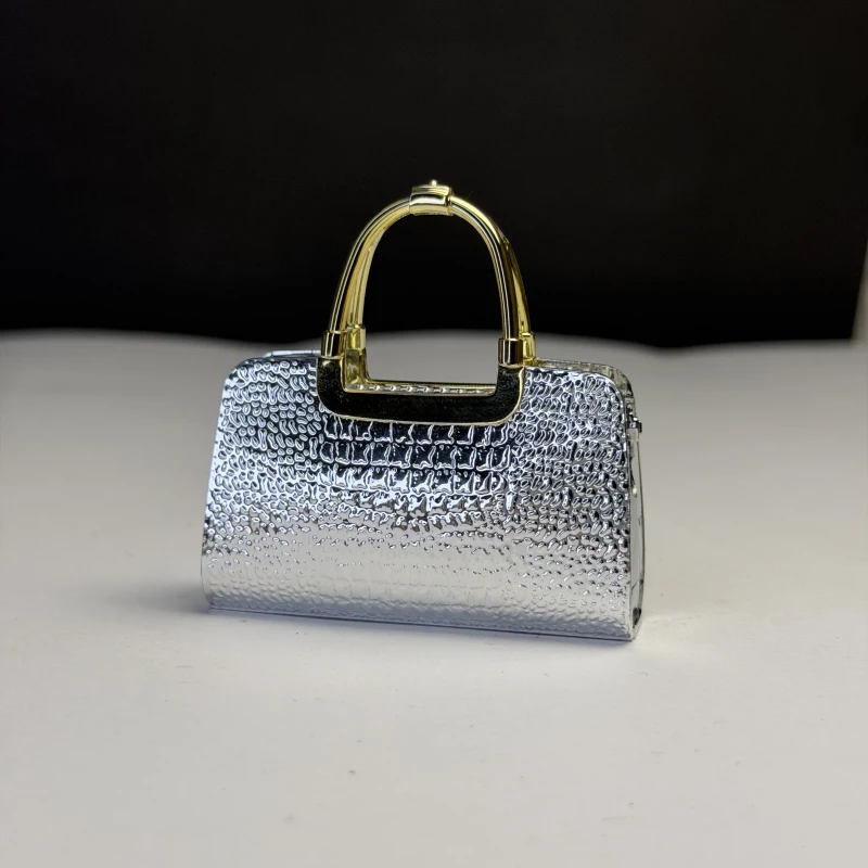 فندک گازی طرح کیف زنانه فانتزی نقره‌ای