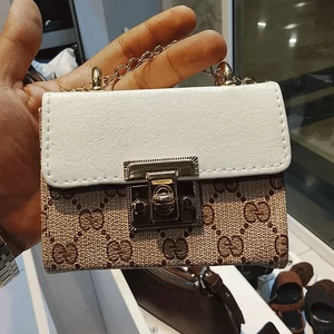 کیف دستی زنانه طرح گوچی دو رنگ با قفل چرخشی فلزی