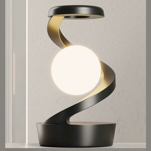 چراغ خواب شارژی طرح کره چرخشی و شارژ وایرلس