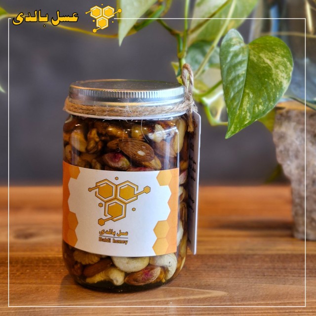 عسل چهار مغز  500 گرمی