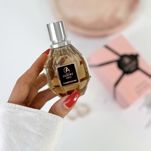 عطر ادکلن ویکتور اند رولف فلاور بمب ( لاکچـری آکوا ) 50میل  Viktor Rolf Flower Bomb( Luxury Aqua )