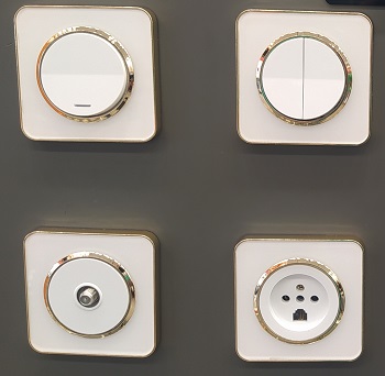 کلید و پریز ایران الکتریک مدل اسپیناس سفید زه طلایی