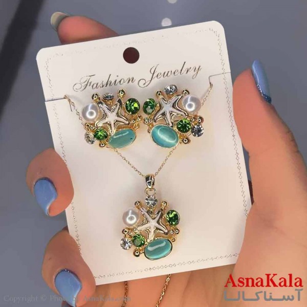 نیم ست زنانه شامل گردنبند و گوشواره  استیل مدل صدف  کد NIM14578W