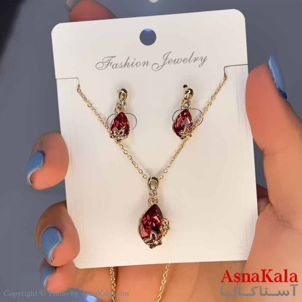 نیم ست زنانه شامل گردنبند و گوشواره  استیل مدل دانه انار  کد NIM14579W