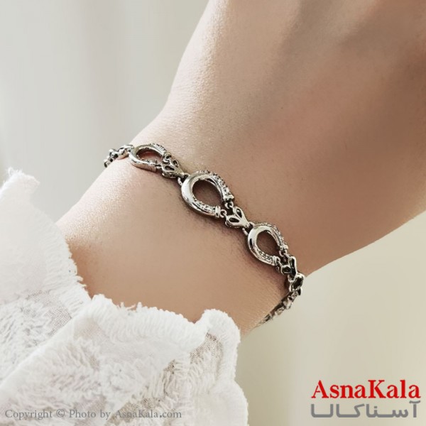 دستبند زنانه ترند برند ژوپینگ مدل نعلی نگینی کد DSB18742W