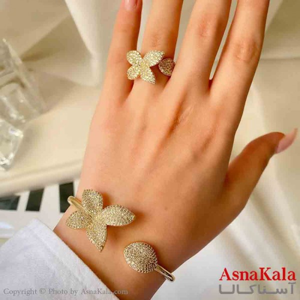 نیم ست زنانه پینترستی  شامل دستبند و انگشتر استیل مدل گل فول نگین طلایی کد NIM14876W