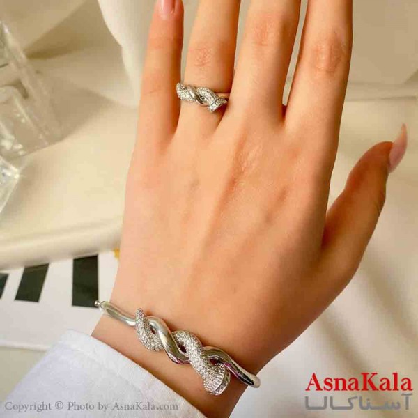نیم ست زنانه پینترستی  شامل دستبند و انگشتر استیل مدل میخ پیچ فول نگین نقره ای  کد NIM14881W
