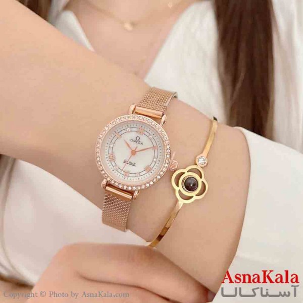 ساعت زنانه امگا دویل  مدل G7611  طرح یونانی قاب نگینی صفحه گرد موتور کوارتز  کد WTCH11336W