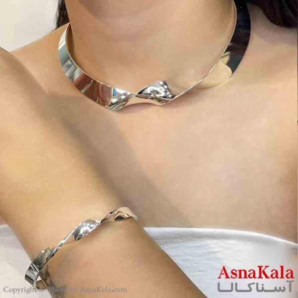 نیم ست زنانه پینترستی  شامل گردنبند و دستبند طرح یک پیچ آینه ای رنگ نقره ایی کد NIM14905W