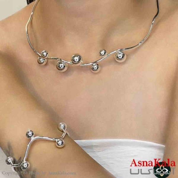 نیم ست زنانه پینترستی  شامل گردنبند و دستبند طرح گوی و هفت و هشت ترند رنگ نقره ای کد NIM14911W
