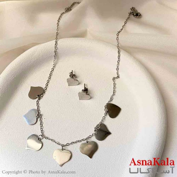 نیم ست زنانه شامل گردنبند و گوشواره استیل مدل قلب رنگ نقره ای کد NIM14934W