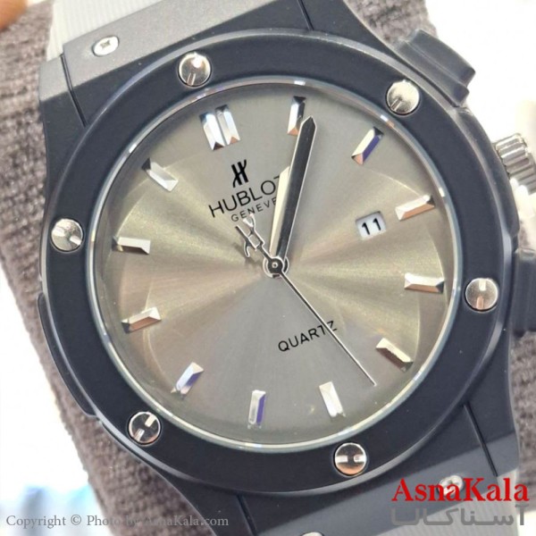ساعت مچی  هابلوت بند چرمی و رابر آبکاری قاب شرکتی کد WTCH11581W