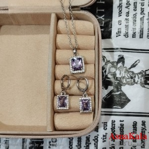 نیم ست زنانه شامل گردنبند و گوشواره نگین دار نقره ای کد NIM141249W