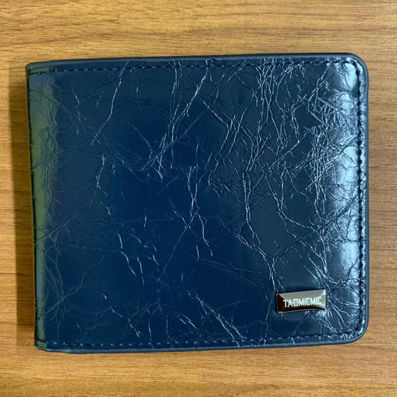 کیف پول و جاکارتی مردانه تائومیک‌میک
