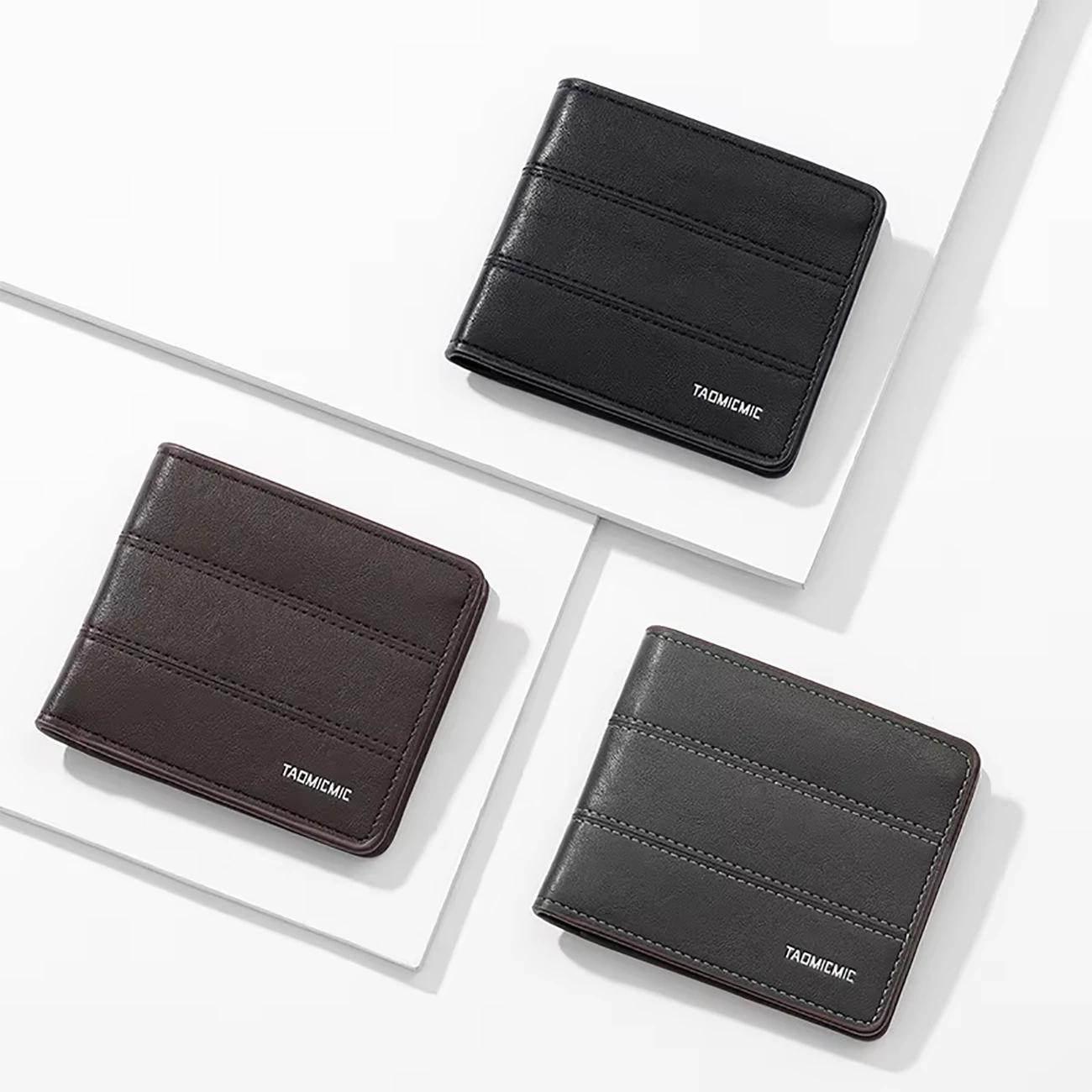 خرید کیف پول مردانه تاشو طرح چرم لوکس تائومیک‌میک