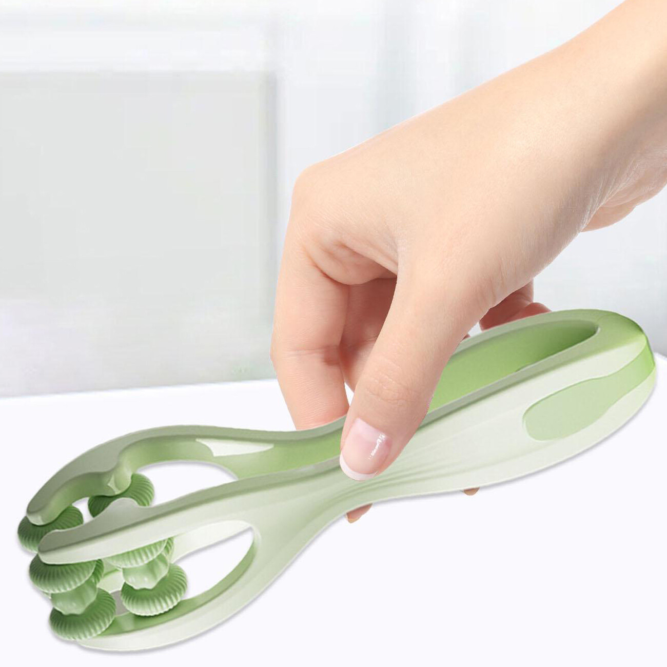 ماساژور انگشتی سبز دو غلتکی