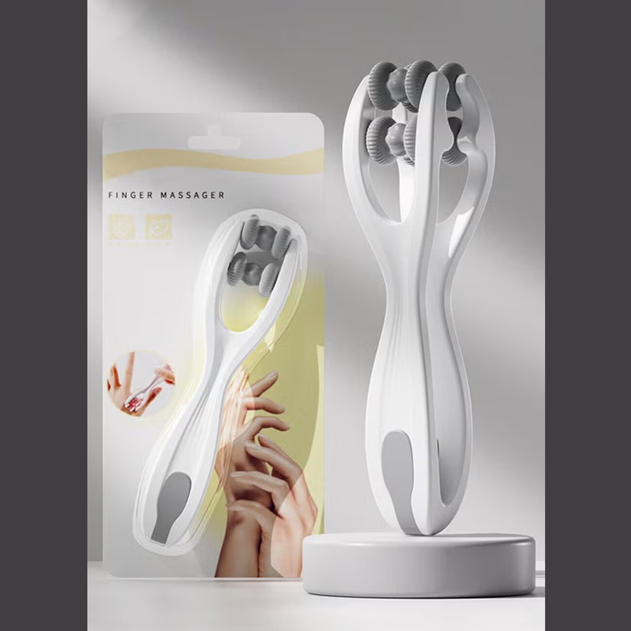 ماساژور انگشتی سفید دو غلتکی