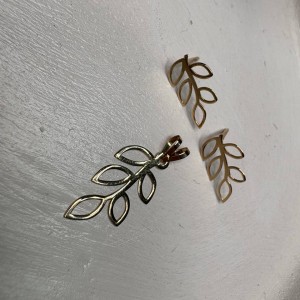 نیم ست طلا طرح برگ وزن 0/590 گرم