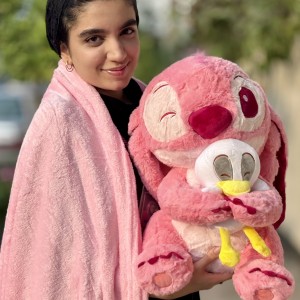 پتو بالشتی استیچ صورتی عروسک به دست